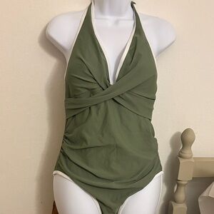 Green Halter Swimsuit with white trim. Rushing on sides. NWOT